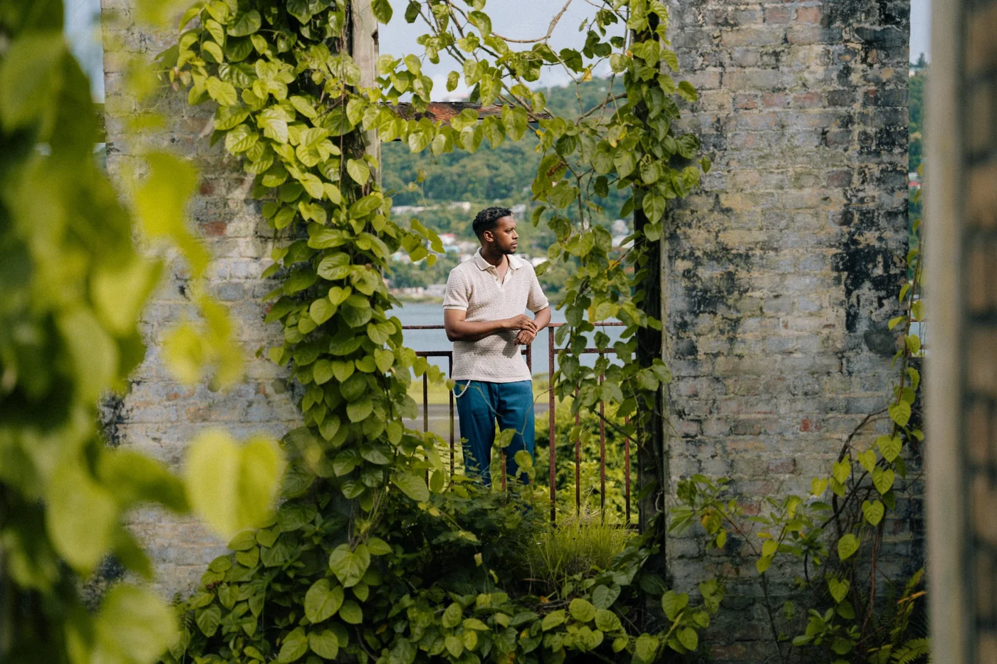 Editorial portrait framed by lush greenery in St. Lucia