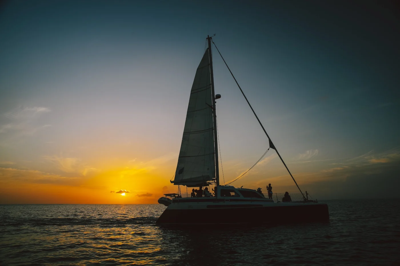 Catamaran sailing at sunset in St. Lucia