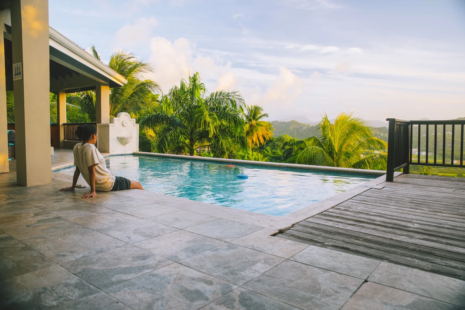 BERLO featured private St. Lucia home with a pool, tropical palms, and elevated island views